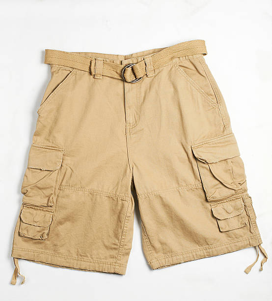 бежевый шорты-карго с поясом - shorts стоковые фото и изображения