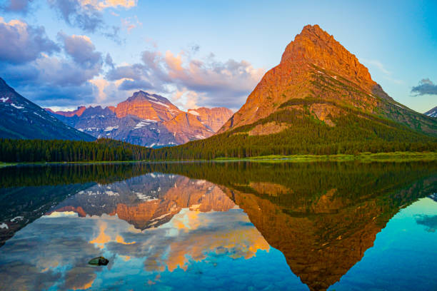 istock Aspen Glow seen across Multiple Mountains in Glacier National Park 1568741113