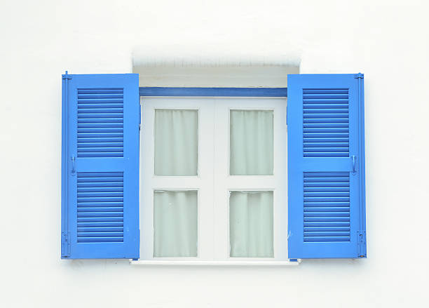 istock Beautiful wooden window on  white concrete wall 156875789