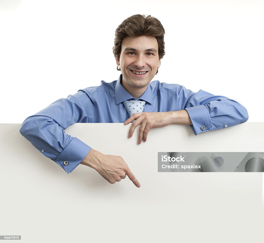 Empresario sosteniendo en blanco de póster - Foto de stock de Adulto libre de derechos