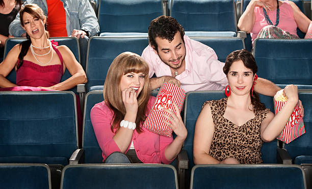 istock Sharing Popcorn in a Theater 156881033