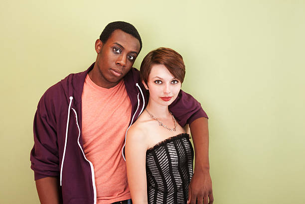 istock Mixed race couple stare at the camera 156881469