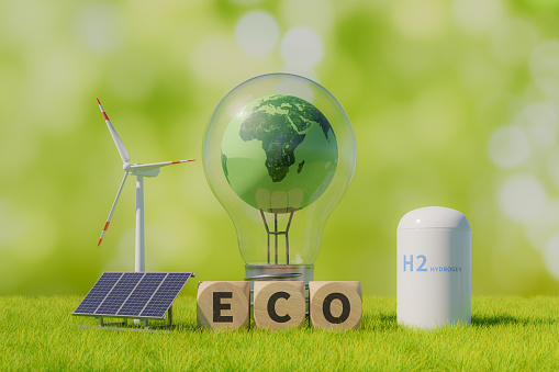 Green energy concept background with wind power,hydrogen energy,solar power and bulb lamp with earth inside wooden cube with lettering eco written on grass, 3d rendering