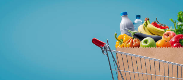 istock Shopping cart with fresh groceries 1568882216