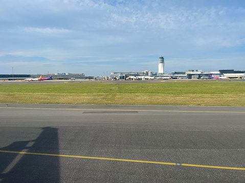 Vienna, Austria - 07 23 2023: Vienna Airport runway, Austria