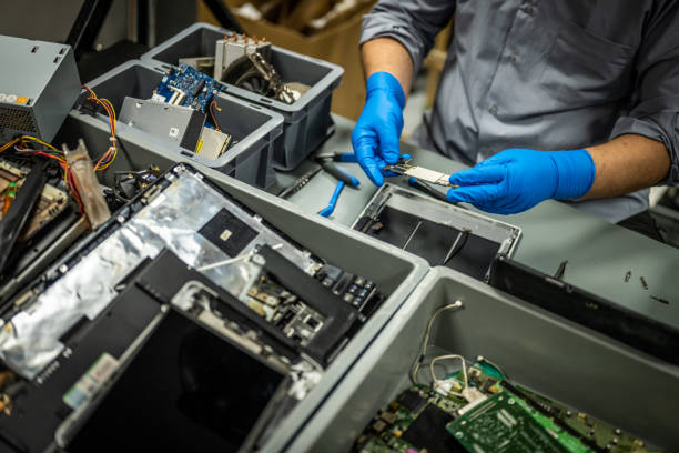 istock Man repairing laptop 1568919847
