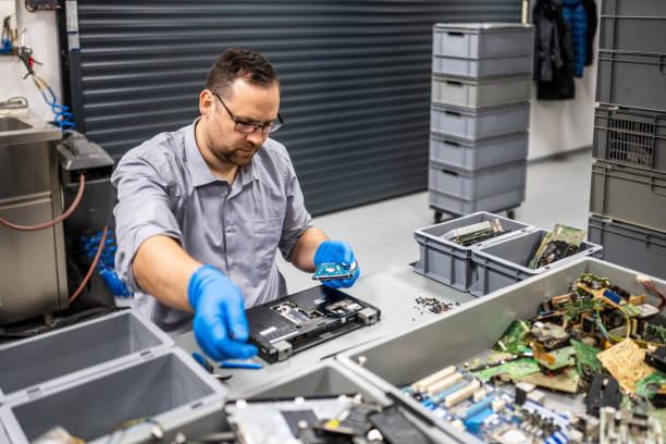 istock Man repairing laptop 1568919853