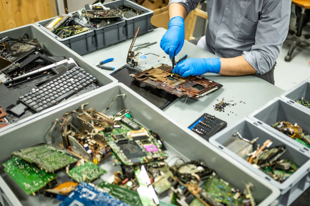 istock Man repairing laptop 1568919860