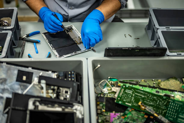 istock Man repairing laptop 1568919862