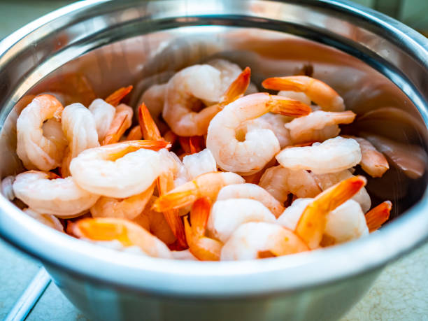 istock Fresh shrimps in cooking pot 1568929160