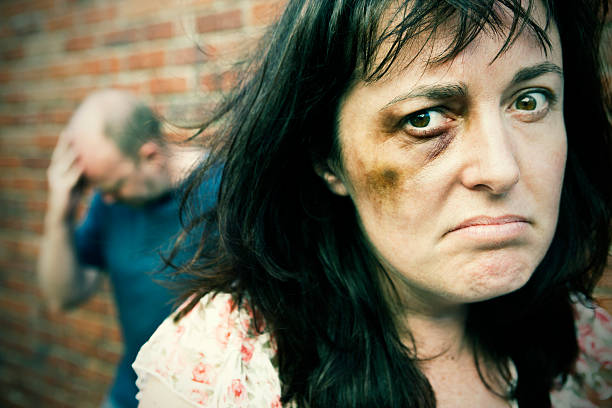 istock Beaten woman looks defiant 156893993