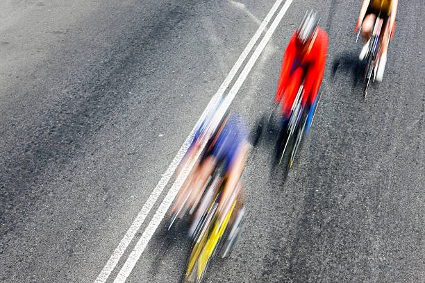 istock Seriously motion-blurred overhead view of racing cyclists 156895896