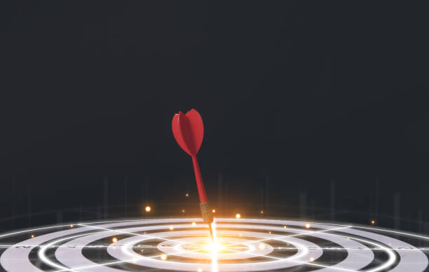 istock The red dart in the middle of the target board. 1568959122