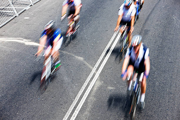 istock Motion-blurred overhead view of cyclists in a race 156897078