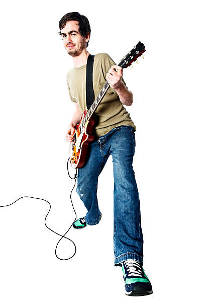 istock Cute young rocker jamming on his electric guitar 156897103
