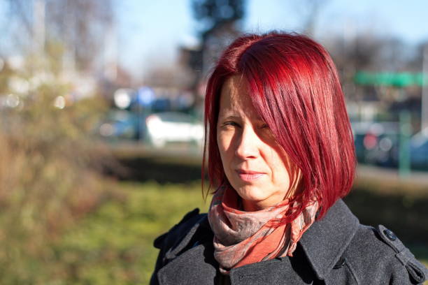 Portrait of mature red haired woman
