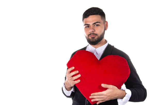 istock Young attractive student with gifts. 1568986965