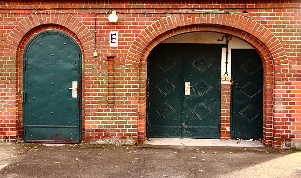 istock old vaulted door and gate background 156901183