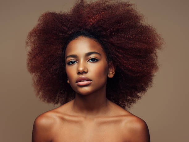 istock Beautiful girl with curly hairstyle 1569025582