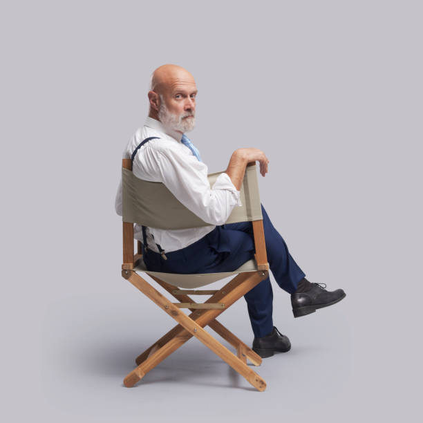 istock Confident film director looking at camera 1569037756