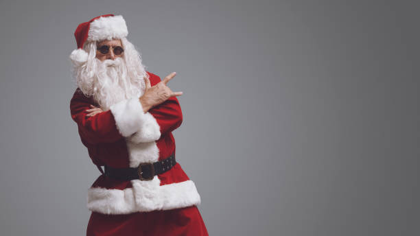 istock Cool rocking Santa Claus with sunglasses 1569045879