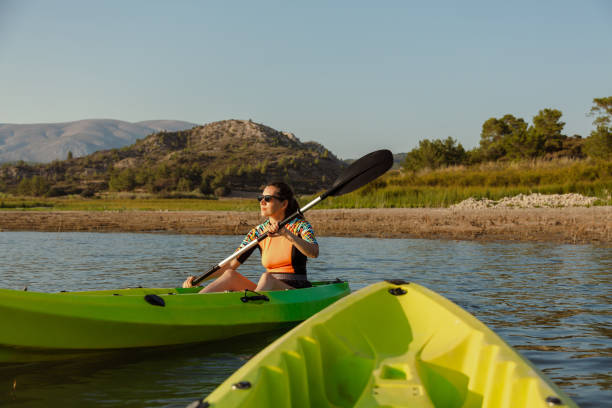 istock Kayaking together on the lake 1569050946