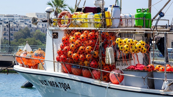 Marsascala, Malta – June 29, 2023: A fishing vessel is being prepped and readied for a voyage at Marsascala, Malta.