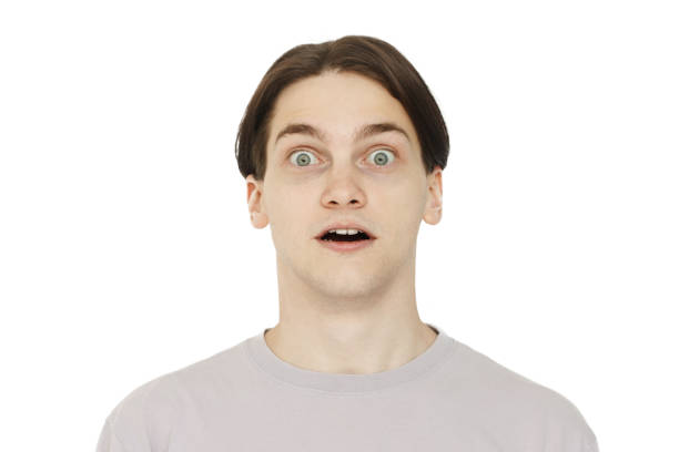 Shocket guy with big eyes and opened mouth isolated on white