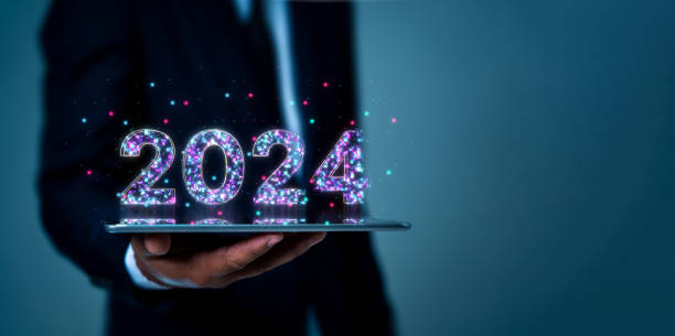 feliz ano novo 2024 com tela virtual 2024. novas metas, planos e números para o próximo ano. empresário tocando o futuro ano de crescimento de 2023 a 2024. planejamento, oportunidade, estratégia de negócios - determination new years eve aspirations letter - fotografias e filmes do acervo