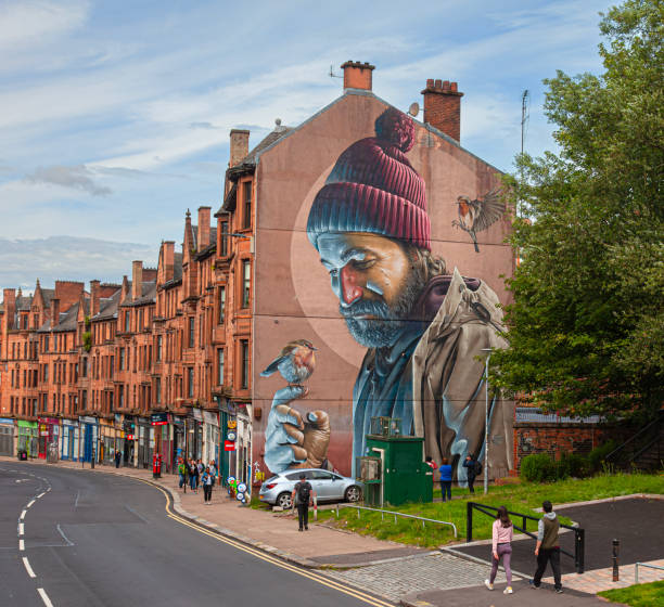 Mural of St Mungo and the Robin by Smug: High St, Glasgow stock photo