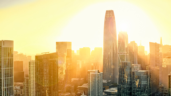 Aerial view of modern downtown city against sky during sunset, San Francisco, California, USA.