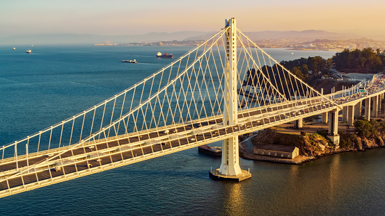 Aerial view of San Francisco-Oakland Bay Bridge during sunset, San Francisco, California, USA.