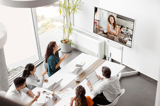 Telework Conference Call Using Smart Video Technology to Communicate Colleague in Professional Corporate Business