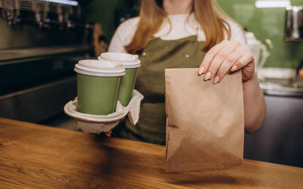 istock hot blackcustomer on counter in modern cafe coffee shop 1569151215