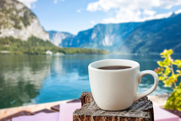 istock white cup of coffee or tea on wooden table 1569159761