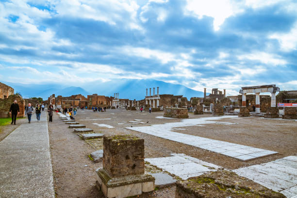 The Civil Forum was the core of daily life of the city Pompeii, Italy - 27th Dec 2022: The Civil Forum was the core of daily life of the city and the focal point of public buildings, administration, justice, business management and trade unesco organised group stock pictures, royalty-free photos & images