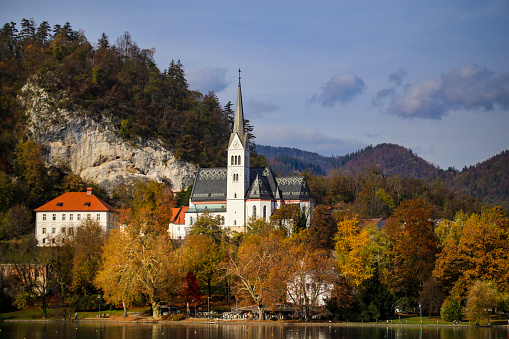 Landscape of town Bled in Slovenia during autumn - St. Martin Parish Church.
