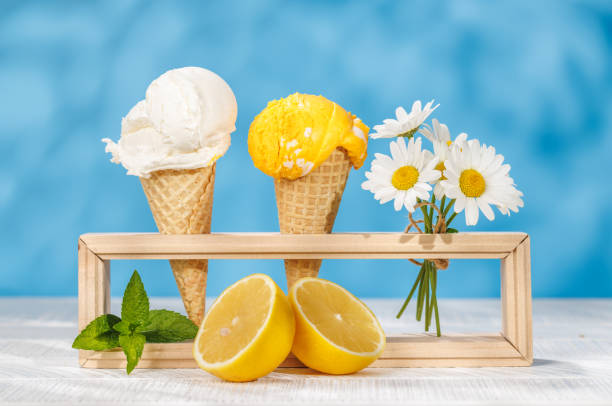 Refreshing ice cream in waffle cones with lemon flavour