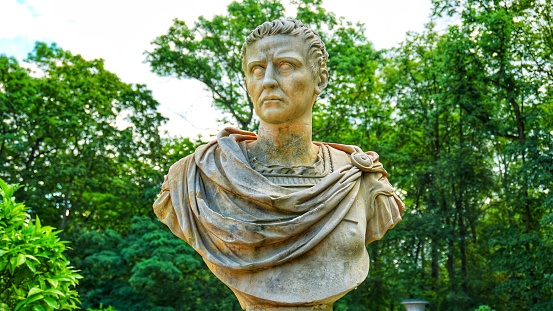 Warsaw, Masovian Voivodeship, Poland - July 20, 2023 Bust of Emperor Caligula in the gallery park. Statue in the \