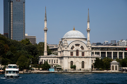 Ortakoy Mosque and the 15 July Martyrs Bridge on the shore of the Bosphorus Strait in the Besiktash area in Istanbul, Turkey
