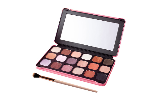 Eyeshadow palette and brush for make-up isolated on white background. Classic Eyeshadow palette with facial mirror. Multicolor eyeshadows