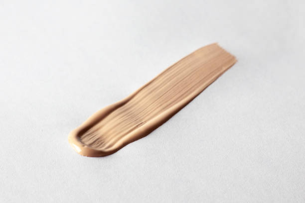 istock Make up smear foundation smudge texture. Liquid foundation swatch close up 1569229018