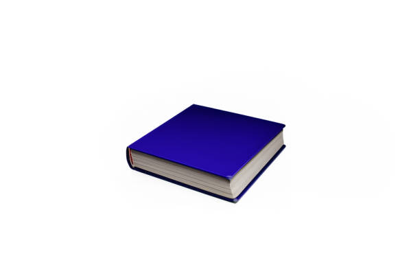 istock Image showing a blue thick hardcover book on a white background, isolated. 1569229287