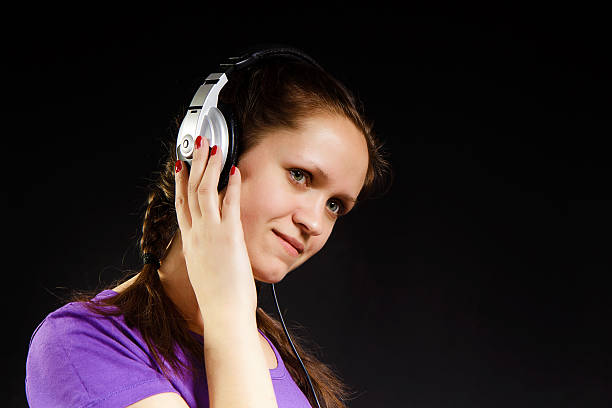 istock girl in headphones 156926847