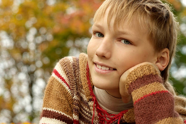 istock happy boy relaxing in autumn 156930841