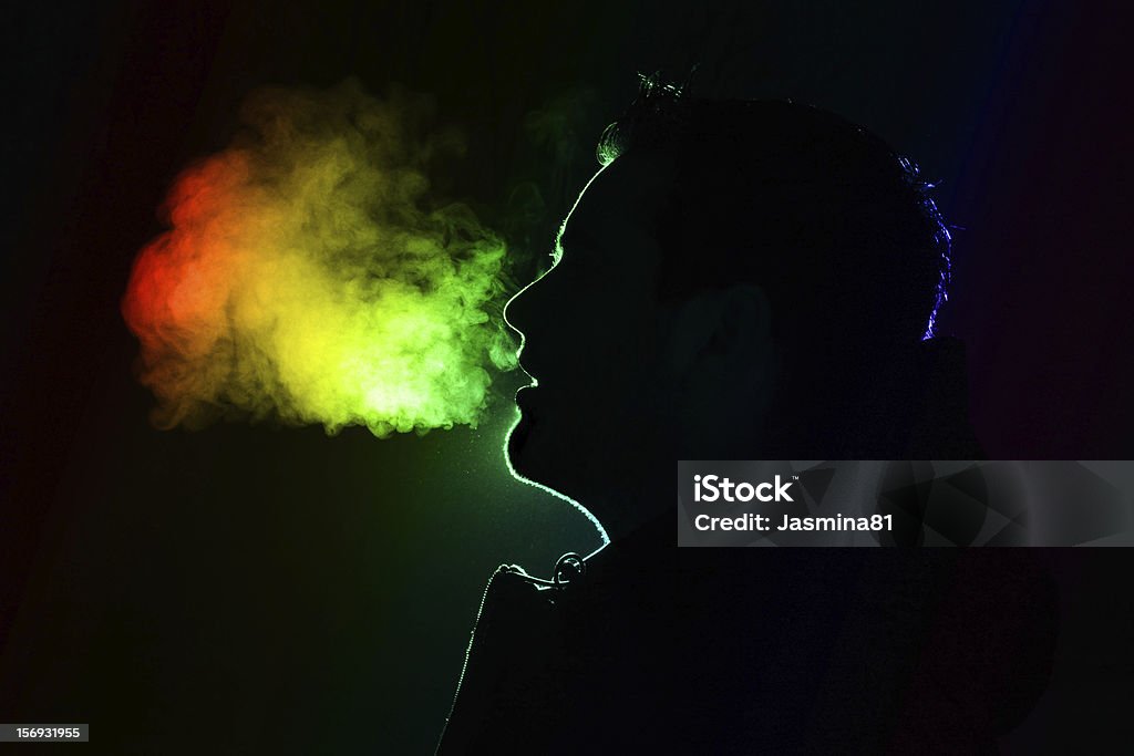 Silhouette of a man Colored outline of a man exhaling warm breath Breath Vapor Stock Photo