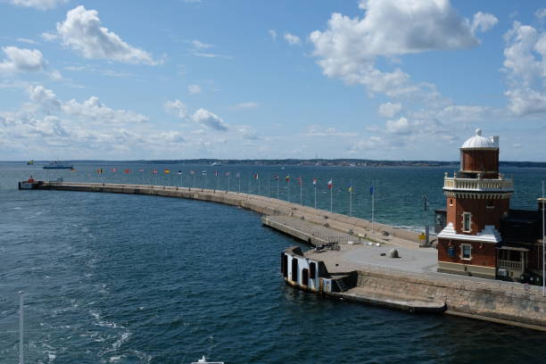 istock Sweden Helsingborg port harbour pier lighthouse 1569339958
