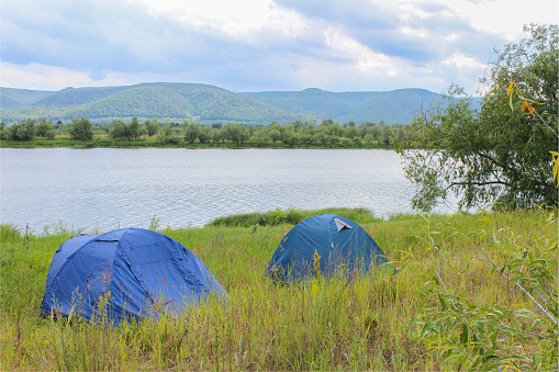 This is a photograph of a small tent setup at a campsite in Glendo State Park, Wyoming, USA.