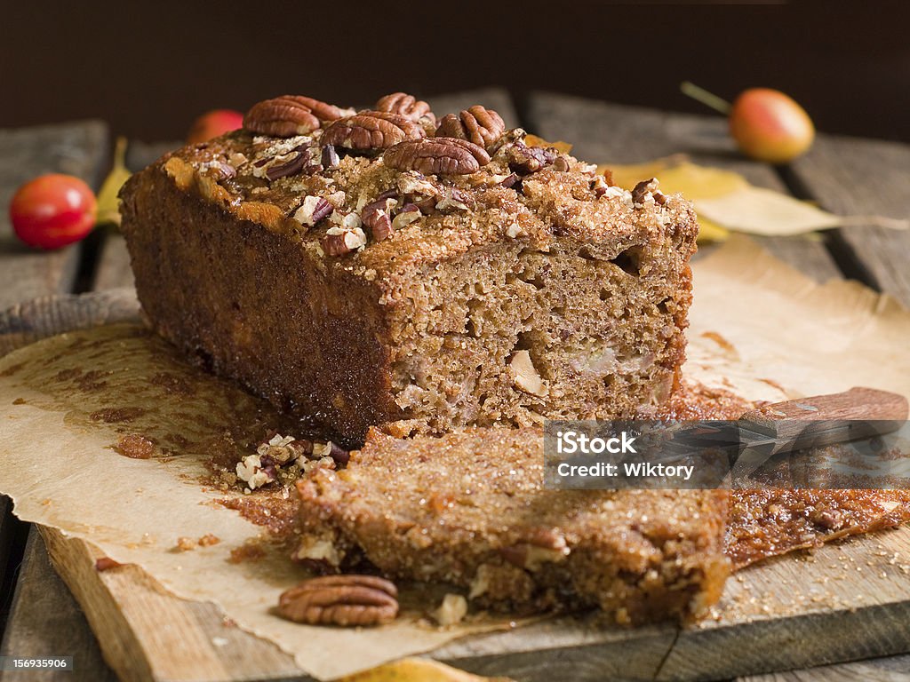 Picture of a chocolate cake with some nuts on top Nuts  and honey cake, selective focus Walnut Stock Photo