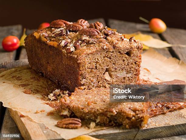 Picture Of A Chocolate Cake With Some Nuts On Top Stock Photo - Download Image Now - Walnut, Cake, Baked Pastry Item